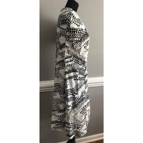 Abe Schrader 1960s short sleeved MOD black and white V-neck calf length dress - Picture 2 of 9